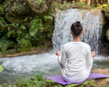 A peaceful garden setting representing a natural healing haven with herbal teas and plants.