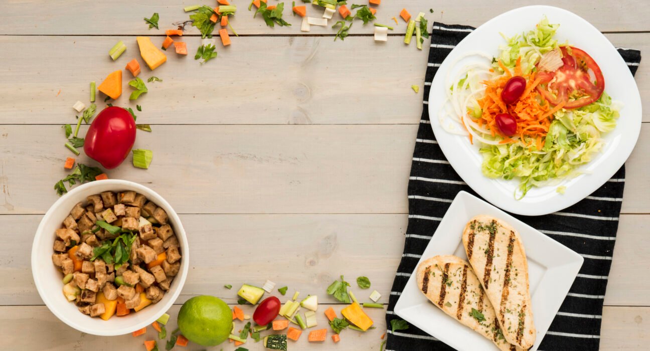 A variety of organized containers showing healthy meal plans for weight loss.