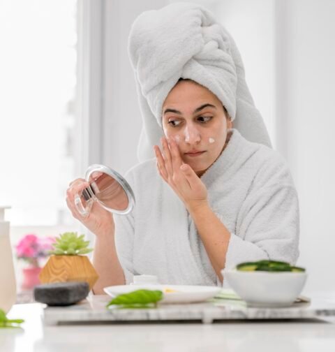 Natural ingredients like honey and turmeric used as home remedies for glowing skin on a clean background