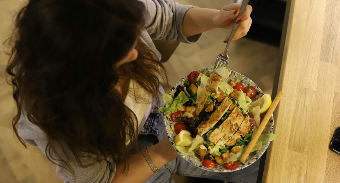 A high calorie healthy meal featuring steak, avocado, and rice for a weight gain diet plan.