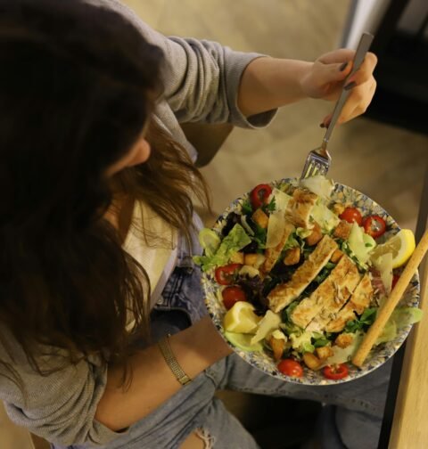 A high calorie healthy meal featuring steak, avocado, and rice for a weight gain diet plan.
