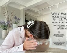Close-up of a person applying cold water treatment to reduce puffy eyes and refresh tired eyes naturally at home.