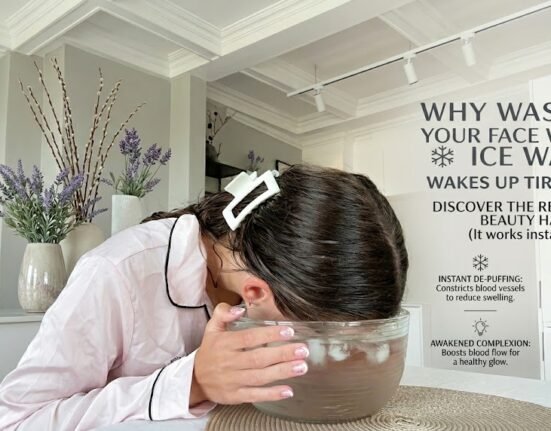 Close-up of a person applying cold water treatment to reduce puffy eyes and refresh tired eyes naturally at home.