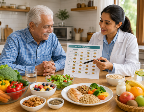 Diet plan for seniors with a dietitian explaining healthy meals, hydration, fruits, vegetables, protein, and whole grains.
